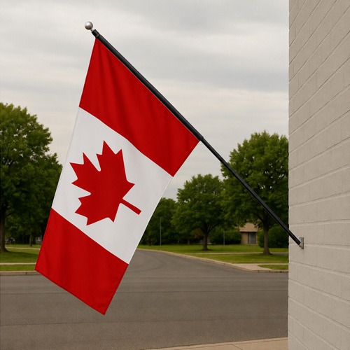 6 ft. black spinning flagpole mounted on a wall with a Canada flag